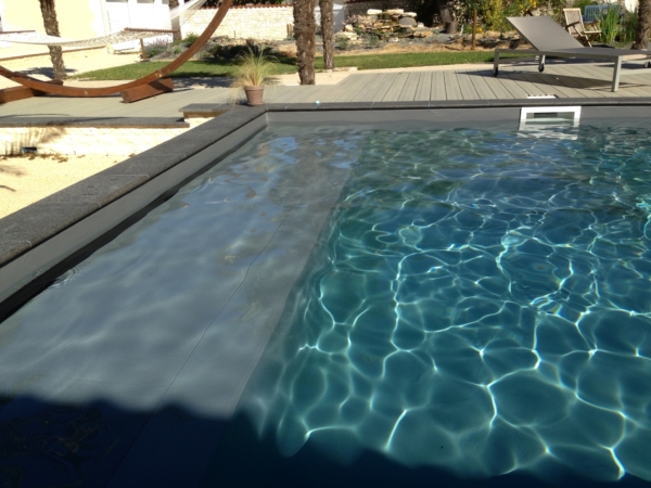 Grafeuille CC Réalisation Piscines & Concept - Piscine traditionnelle - Piscine en verre - Volet immergé