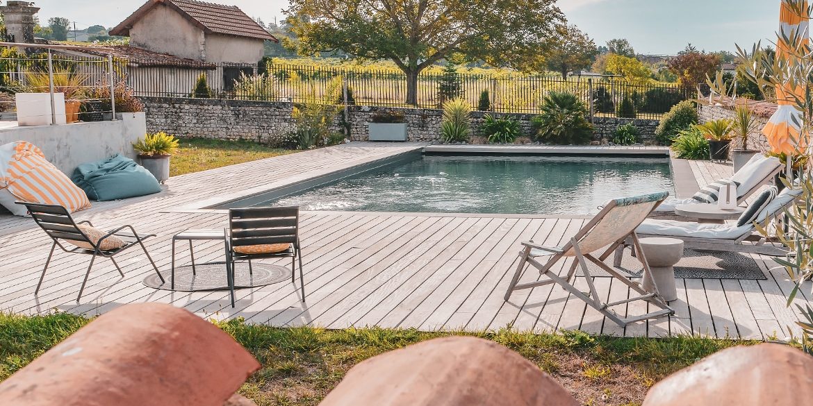 Réalisation Piscines & Concept - Piscine traditionnelle -membrane armée - Volet immergé