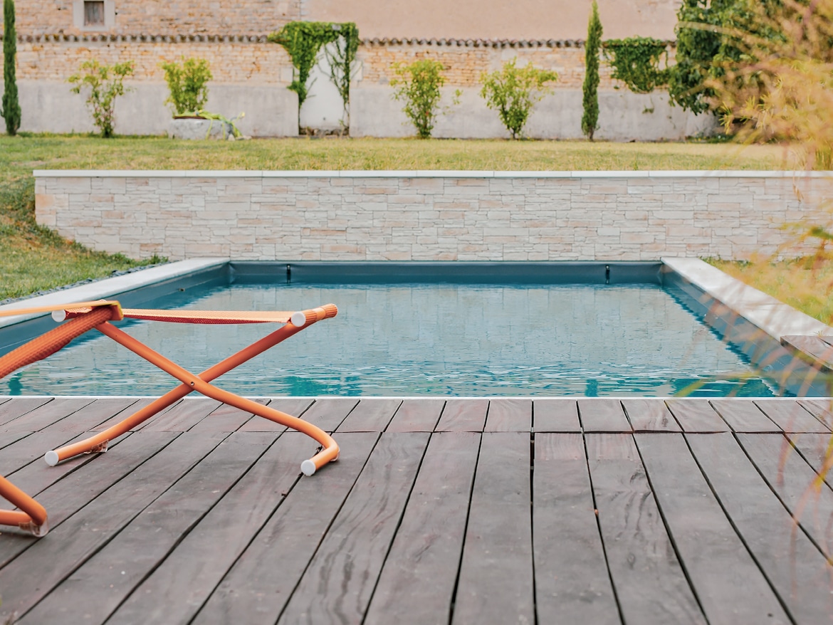 Réalisation Piscines & Concept - Piscine traditionnelle -membrane armée - Volet immergé