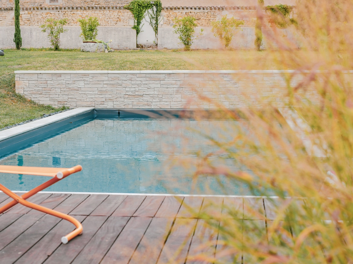 Réalisation Piscines & Concept - Piscine traditionnelle -membrane armée - Volet immergé