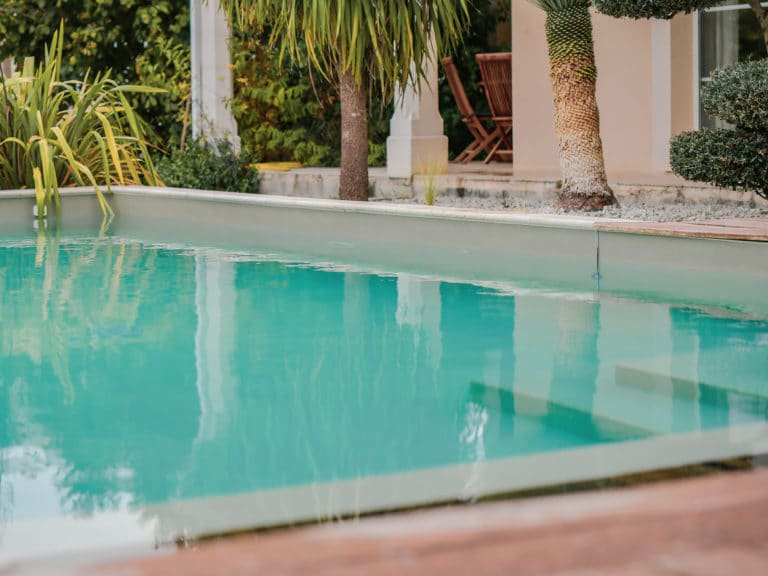 Charlot Réalisation Piscines & Concept - Piscine traditionnelle -membrane armée - Volet immergé